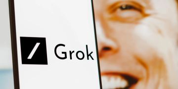 Smartphone Bildschirm Vordergrund Logo Grok Hintergrund Musk Lachen