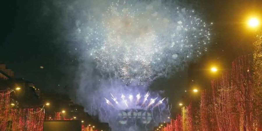 Neujahrsfeierlichkeiten auf der Champs-Elysees 2019. Foto: Michel Euler/AP/dpa