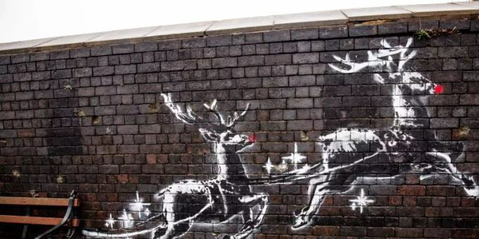 Banksy-Kunstwerk mit dem Titel «God Bless Birmingham» («Gott segne Birmingham») auf einer Backsteinmauer. Foto: Jacob King/PA Wire/dpa Banksy-Kunstwerk mit dem Titel «God Bless Birmingham» («Gott segne Birmingham») auf einer Backsteinmauer. Foto: Jacob King/PA Wire/dpa