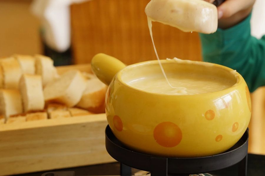 Fondue-Sets Käsefondue Symbolbild