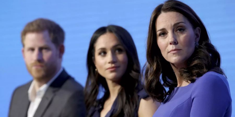 Kate, Prinz Harry und Meghan Markle im Februar 2018.