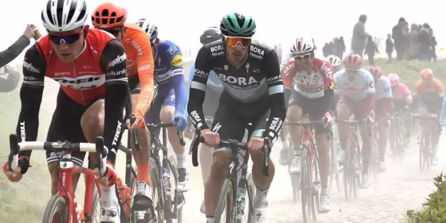 Das für Kopfsteinpflasterrennen Paris-Roubaix muss verlegt werden. Foto: Dirk Waem/BELGA/dpa