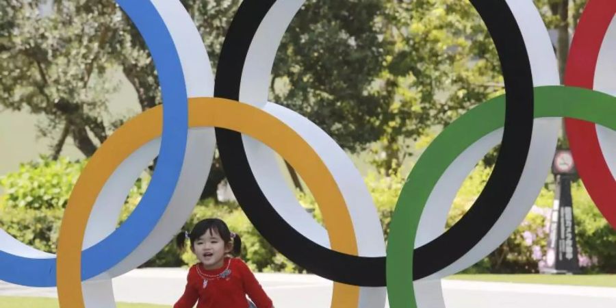 Die Athleten Deutschland haben das Festhalten des IOC am Verbot von Protestaktionen auf dem Siegerpodium kritisiert. Foto: Koji Sasahara/AP/dpa