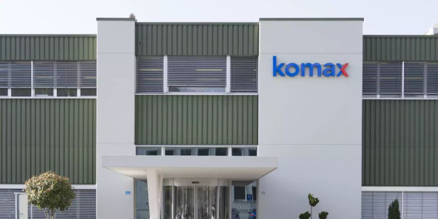 Komax Holding