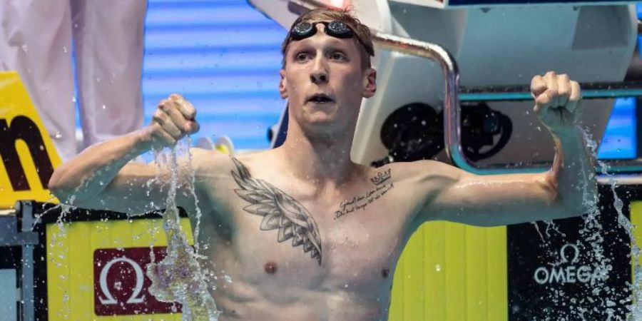 Florian Wellbrock feiert seine zweite WM-Goldmedaille in Südkorea. Foto: Bernd Thissen
