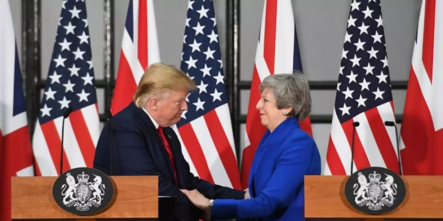 Theresa May und Donald Trump während ihrer gemeinsamen Pressekonferenz. Foto: Stefan Rousseau/PA