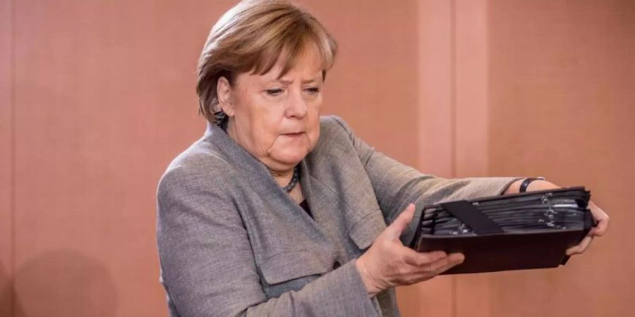 Kommt aus der Sommerpause zurück: Bundeskanzlerin Angela Merkel. Foto: Michael Kappeler/Archiv