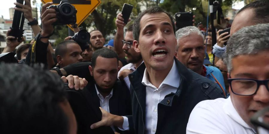 Juan Guaido attends a Sunday Mass in Caracas