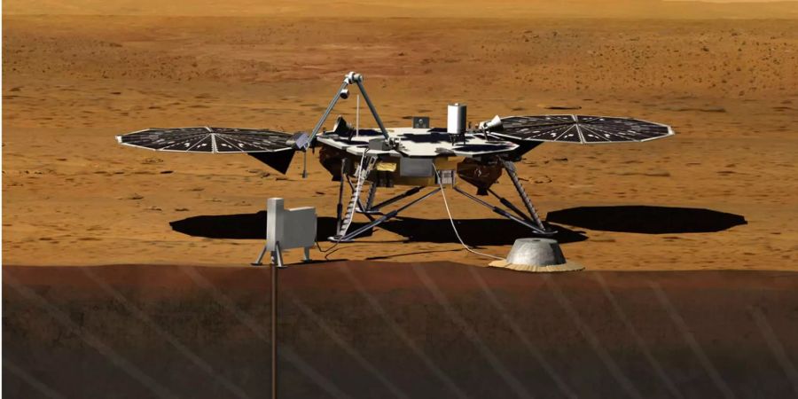 Dieses Bild der Nasa zeigt einen Entwurf des vorgeschlagenen InSight-Lander. Nachdem die NASA mit vier Rovern rund um den Mars unterwegs ist, will sie mit dem neuen Lander tief ins Innere des roten Planeten blicken.