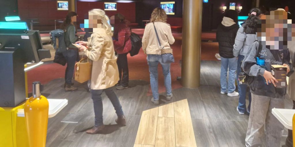 Large movie theaters rely on ticket machines and self-checkout for popcorn