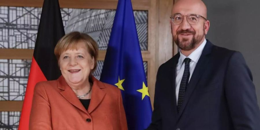 Angela Merkel beim Treffen mit dem neuen EU-Ratspräsidenten Charles Michel. Foto: Stephanie Lecocq/EPA Pool/AP/dpa