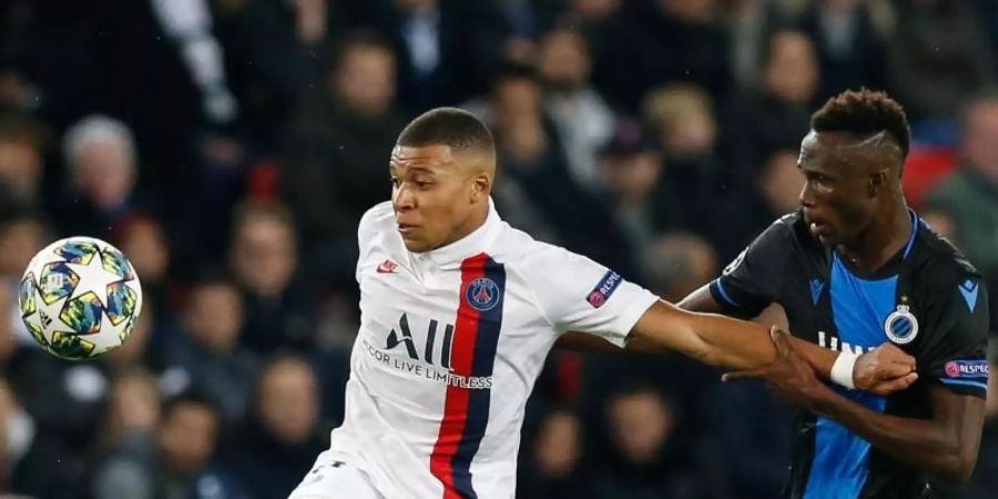 PSG-Star Kylian Mbappé (l) in Aktion. Foto: Bruno Fahy/BELGA/dpa