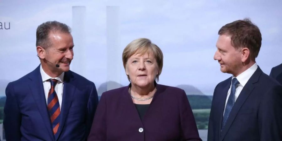 VW-Chef Diess, Merkel und Kretschmer in Zwickau (v.l.)