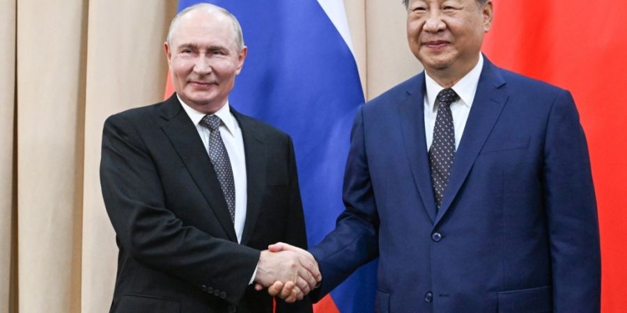Der russische Präsident Wladimir Putin (l) und Chinas Staats- und Parteichef Xi Jinping. Foto: Kristina Solovyova/Pool Sputnik Kremlin/AP/dpa