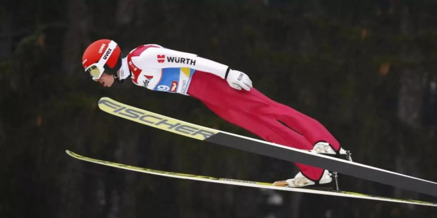 Eric Frenzel legte einen starken Sprung hin. Foto: Matthias Schrader/AP