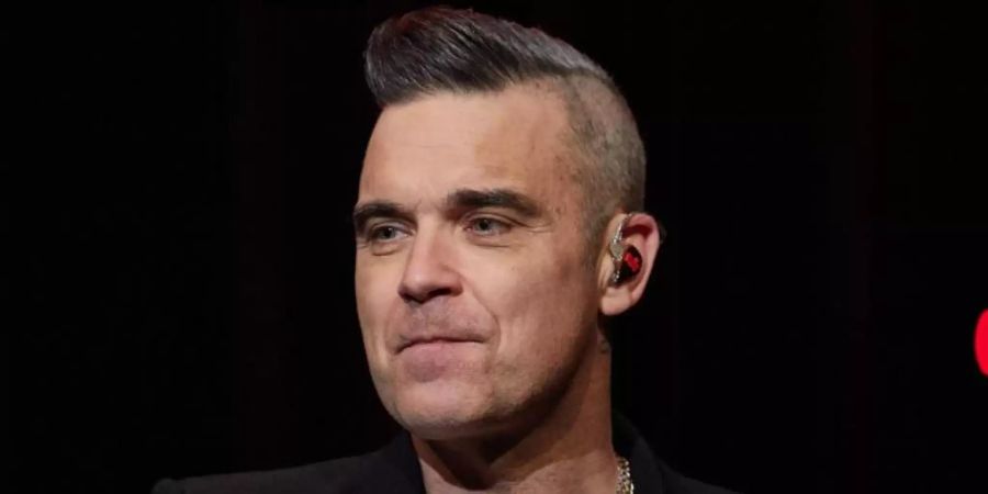 «Gelegenheitsmusiker» und Vollzeitvater: Robbie Williams. Foto: Georg Wendt/dpa