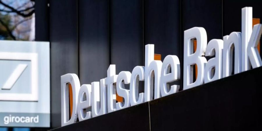 Der Konzernumbau der Deutschen Bank, bei dem auch Tausende Stellen gestrichen werden, geht weiter. Foto: Hauke-Christian Dittrich/dpa