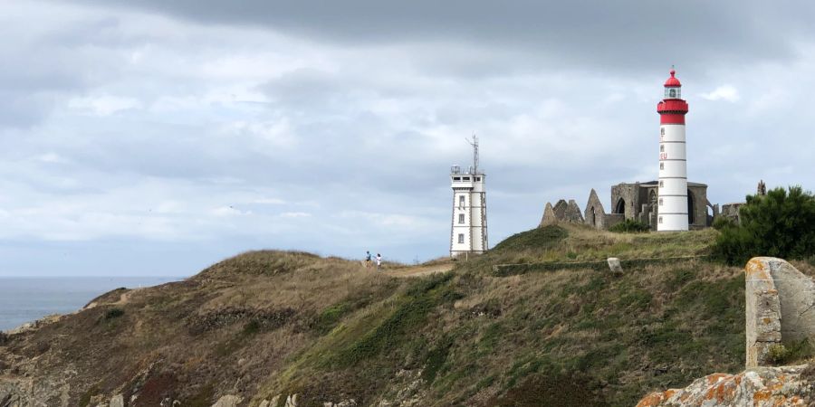 Küste Felsen Leuchtturm Meer