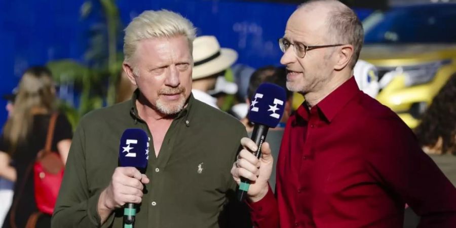 Bei den Australian Open vor allem als TV-Experte im Einsatz: Boris Becker (l). Foto: Frank Molter/dpa