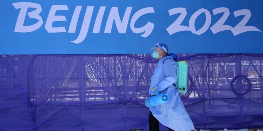 Bei den Winterspielen in Peking hat es 45 neue Corona-Fälle gegeben. Foto: Kirsty Wigglesworth/AP/dpa