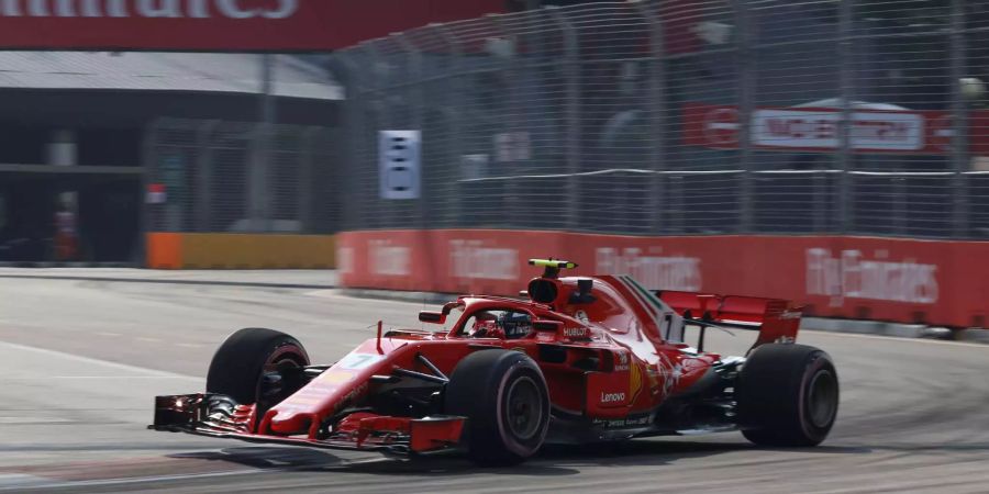 Kimi Räikkönen vom Team Ferrari in Aktion am GP in Singapur.