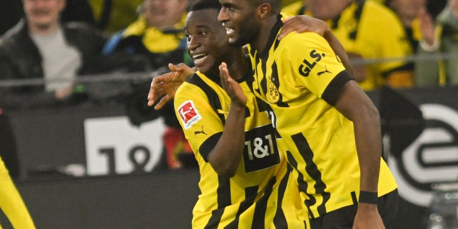 Anthony Modeste (r) und Youssoufa Moukoko könnten künftig beim BVB als Doppelspitze auflaufen.