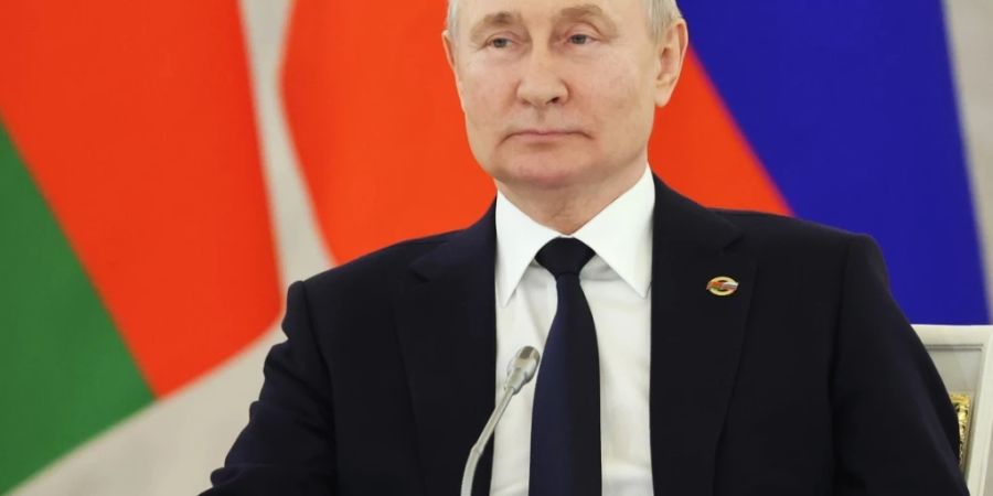 Dieses von der staatlichen russischen Nachrichtenagentur Sputnik via AP veröffentlichte Foto zeigt Wladimir Putin, Präsident von Russland, bei einer Tagung des russisch-belarussischen Staatsrats. Foto: Mikhail Klimentyev/Sputnik Kremlin/AP/dpa - ACHTUNG: Nur zur redaktionellen Verwendung und nur mit vollständiger Nennung des vorstehenden Credits