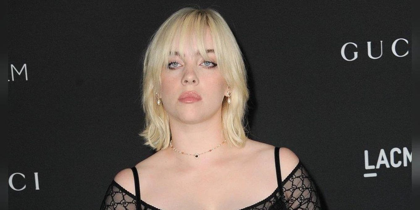 Lush Billie Eilish Poses In Low-cut Top As She Makes Rare Move Of Showing Off Her Body While Sipping From Baby Bottle Photo in HD Lush Billie Eilish Poses In Low-cut Top As She Makes Rare Move Of Showing Off Her Body While Sipping From Baby Bottle Photo in HD