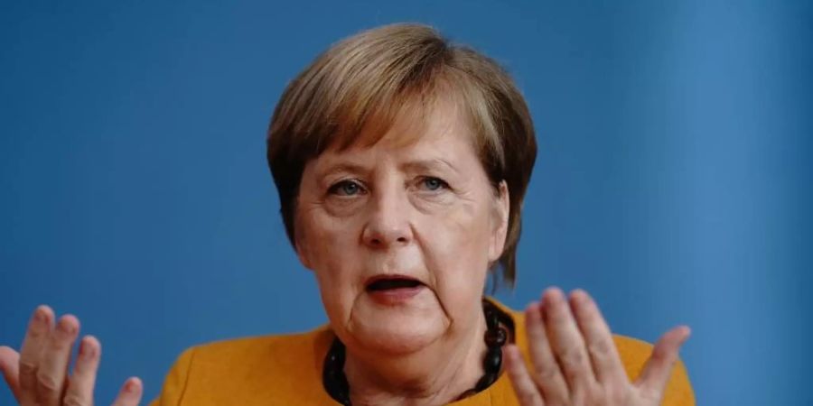 Bundeskanzlerin Angela Merkel (CDU) informiert über die Ergebnisse des Kabinetts zu den Corona-Massnahmen. Foto: Kay Nietfeld/dpa-Pool/dpa