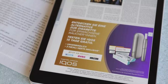 Werbung für das Tabakerzeugnis IQOS. Tabakwerbung EVP