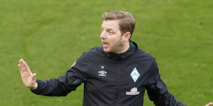 Trainer Florian Kohfeldt will seine Bremer Fussballprofis fit halten. Foto: Clara Margais/dpa