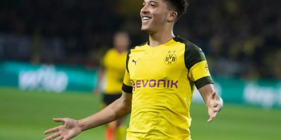 Dortmunds Jadon Sancho jubelt über seinen Treffer gegen Bayer Leverkusen. Foto: Bernd Thissen