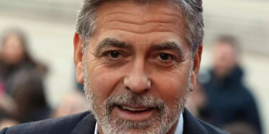 Schauspieler George Clooney engagiert sich seit vielen Jahren auch politisch. Foto: Andrew Milligan