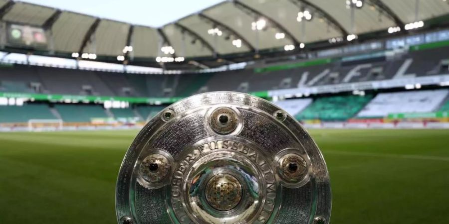 Die Bundesliga steht vor einem Sommer voller Ungewissheit. Foto: Kai Pfaffenbach/Reuters-Pool/dpa