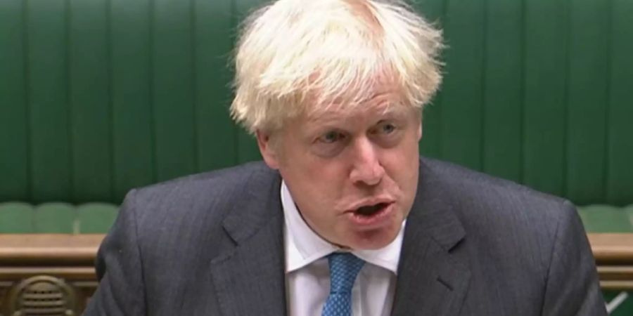 HANDOUT - Boris Johnson, Premierminister von Grossbritannien, spricht im britischen Unterhaus, wo er an den «Prime Minister's Questions» («Fragen an den Premierminister»), teilnimmt. Foto: House Of Commons/PA Wire/dpa - ACHTUNG: Nur zur redaktionellen Verwendung im Zusammenhang mit der aktuellen Berichterstattung und nur mit vollständiger Nennung des vorstehenden Credits