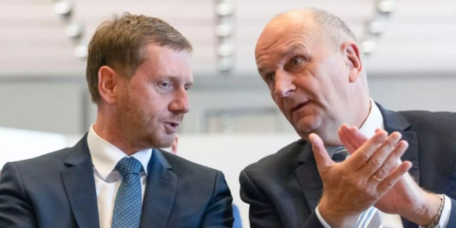 Die Ministerpräsidenten von Sachsen und Brandenburg, Michael Kretschmer (CDU) und Dietmar Woidke (SPD)