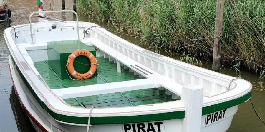 Das Börteboot «Pirat» mit neuem Elektroantrieb liegt neben der Bootswerft Hatecke in Freiburg an der Elbe. Rainer Hatecke/dpa Foto: Rainer Hatecke