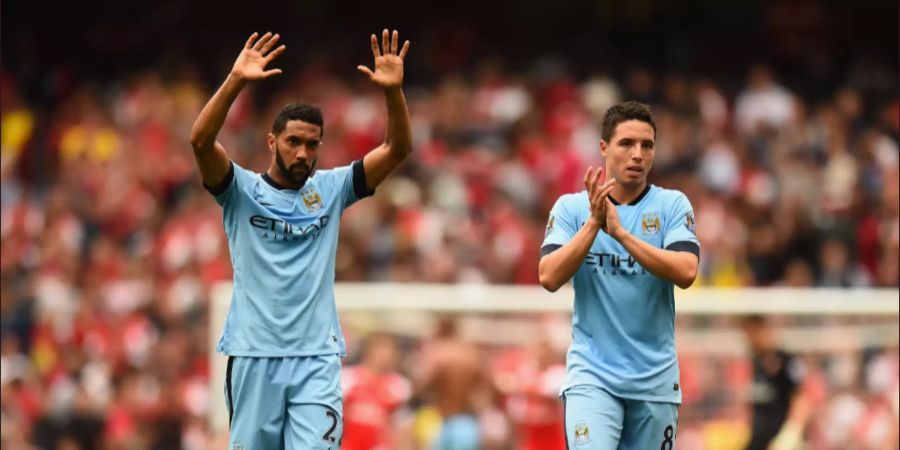 Samir Nasri (r.) und Gaël Clichy wechselten 2011 von Arsenal zu Manchester City und wurden dafür angefeindet.