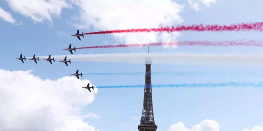 In einer spektakulären Show hatten die Macher der Sommerspiele 2024 für den nächsten Olympia-Gastgeber Paris geworben. Foto: Gao Jing/XinHua/dpa