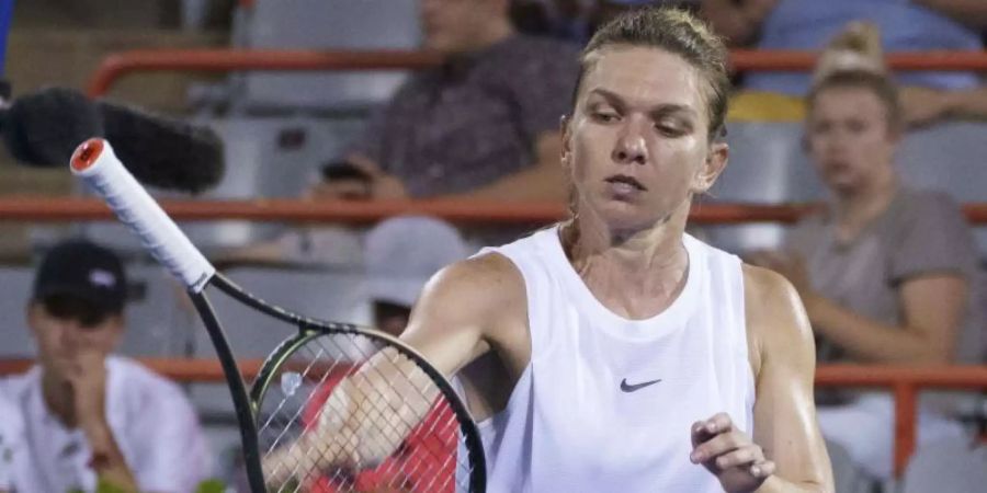 Simona Halep bangt um ihre Teilnahme an den US Open. Foto: Paul Chiasson/The Canadian Press via ZUMA/dpa