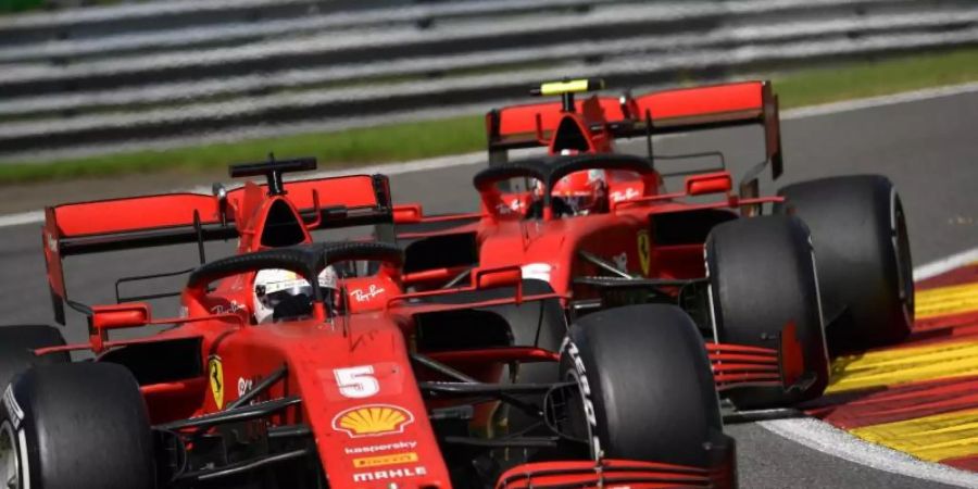 Mit Ferrari in dieser Saison meist hinterher: Sebastian Vettel (vorne) und Charles Leclerc. Foto: John Thys/POOL AFP/AP/dpa