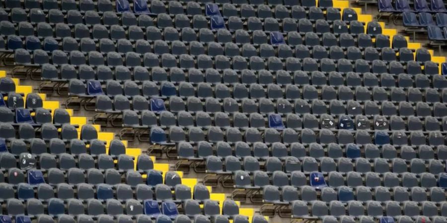 Auch am 4. Spieltag der Bundesliga lässt die Coronavirus-Pandemie kaum Zuschauer in den Stadien zu. Foto: Alexander Hassenstein/getty/Pool/dpa