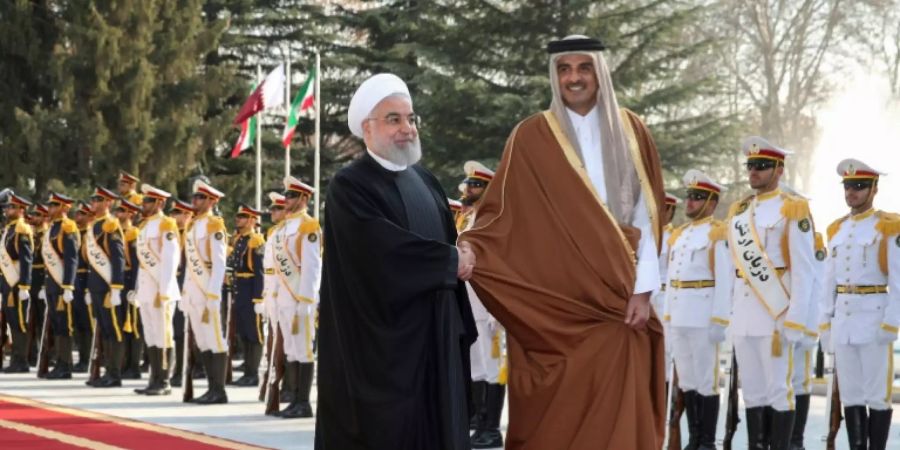 Irans Präsident Ruhani (l.) und der Emir von Katar