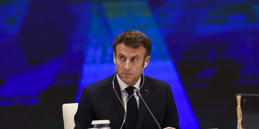 Frankreichs Präsident Emmanuel Macron bei einem informellen Dialog der Apec-Staats- und Regierungschefs in Bangkok. Foto: Athit Perawongmetha/Pool Reuters/AP/dpa