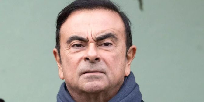 Carlos Ghosn bei einem Besuch von Emmanuel Macron in Frankreich.