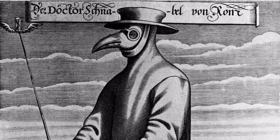 Ein mittelalterlicher Arzt mit einer Pest-Maske.