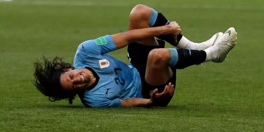 Der leidvolle Moment, der entscheidend werden könnte: Edinson Cavani verletzt sich gegen Portugal in der 74. Minute.