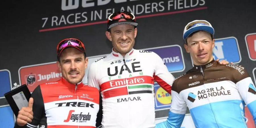 John Degenkolb (l-r), Alexander Kristoff und der Oliver Naesen. Foto: Yorick Jansens/BELGA