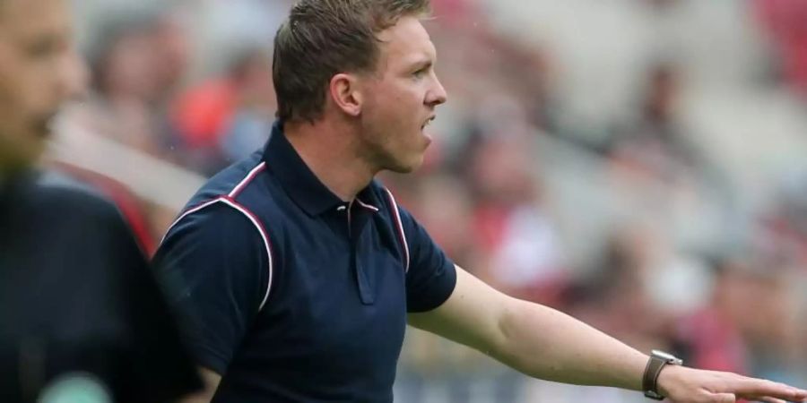 Hoffenheims Trainer Julian Nagelsmann ist enttäuscht nach der Niederlage in Mainz. Foto: Thomas Frey