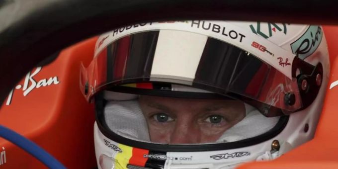 Konzentriert: Ferrari-Pilot Sebastian Vettel. Foto: Vincent Thian/AP/dpa Konzentriert: Ferrari-Pilot Sebastian Vettel. Foto: Vincent Thian/AP/dpa